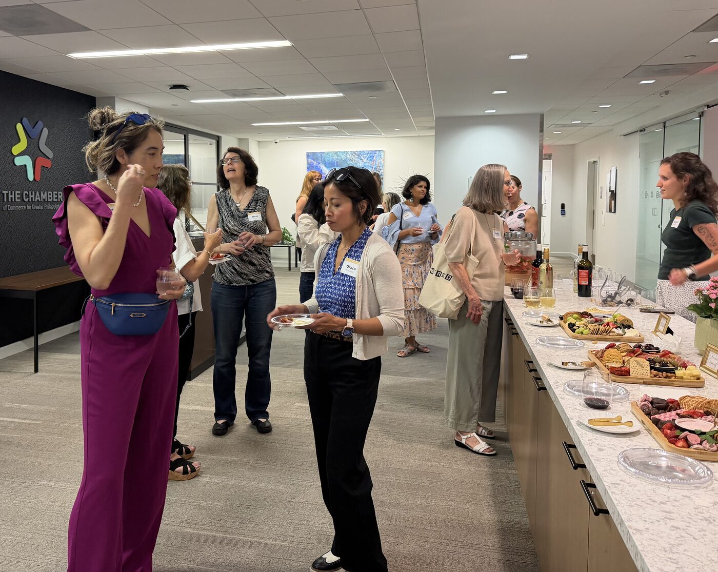 Women gathered for the reception at the Strawberry Moon gathering, June 2026